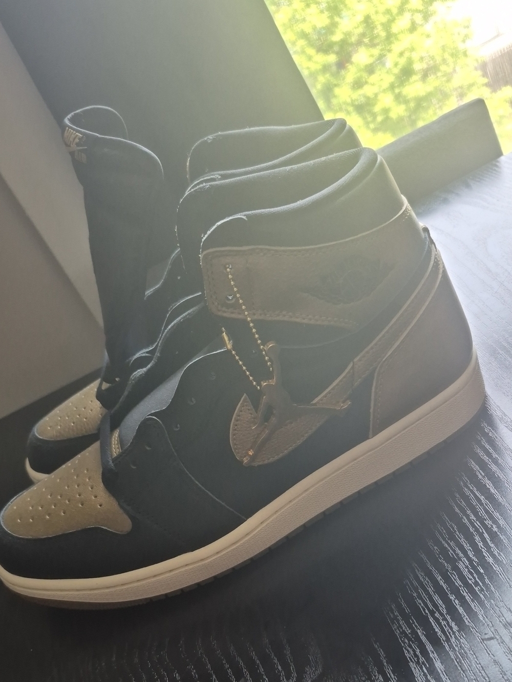 Nike High-Top Sneakers in Black and Metallic Gold